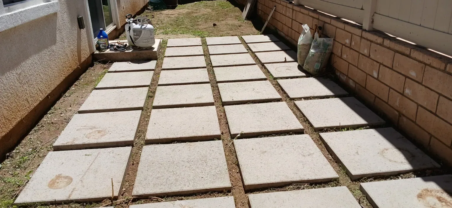 After: The existing square-paver walkway after weeding.