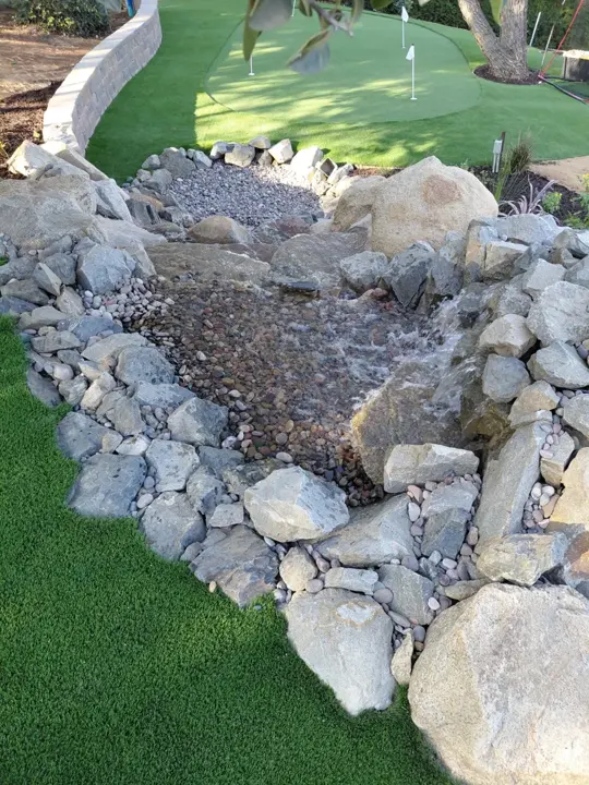 A close view of the rock-lined collection basin.